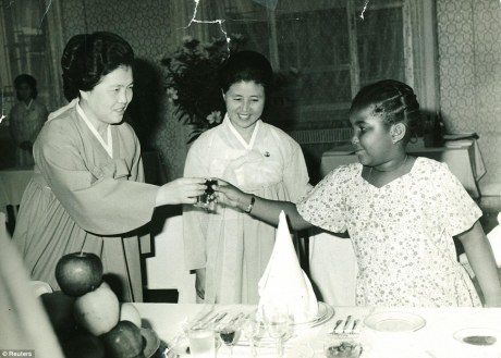 Bizarre childhood: Monique Macias (right) shares a toast with North Korean founder Kim Il-Sung's second wife, Kim Sung-Ae (left) in 1978 Read more: http://www.dailymail.co.uk/news/article-2442059/Monique-Macias-Daughter-African-dictator-tells-life-growing-North-Korea. 